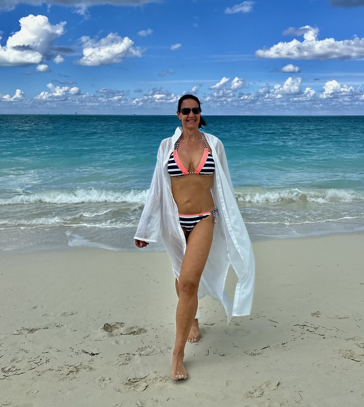 Marni Schwartz walking on the beach